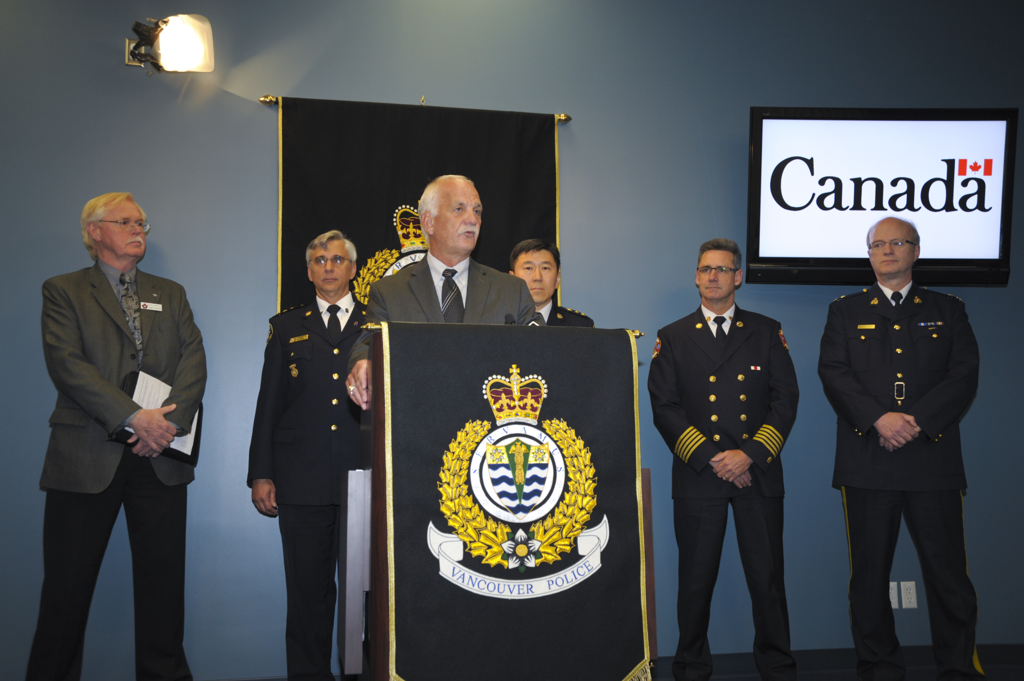 Left to Right: Larry Odegard - Chief Executive Officer St. John's Ambulance; Don McPherson - Superintendant, BC Ambulance Service; The Honourable Vic Toews, Minister of Public Safety Canada; Chief Constable Jim Chu, Vancouver Police Department; Chief John McKearney - Vancouver Fire and Rescue Services, also representing the Canadian Association of Fire Chiefs; Dennis Crowe - Inspector, Operational Readiness and Response RCMP E-Division